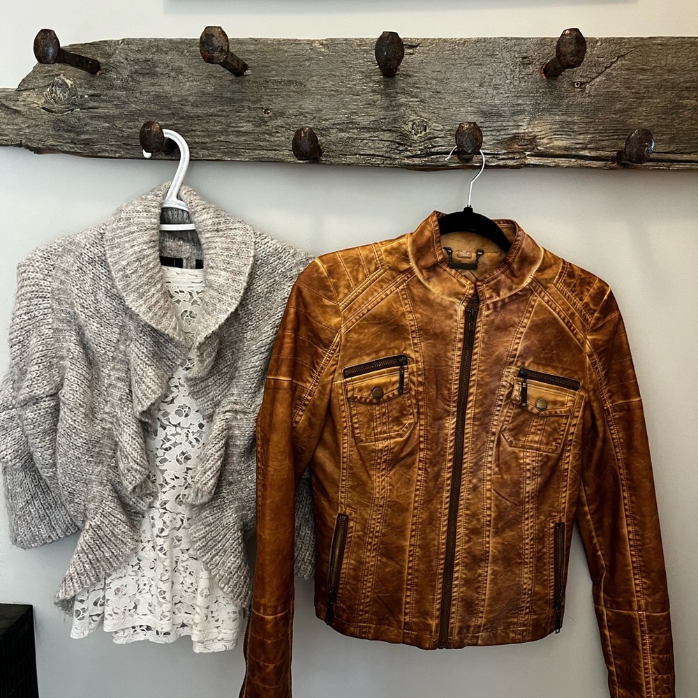 FAUX leather jacket, feels soft like real leather but it is not! Ladies small